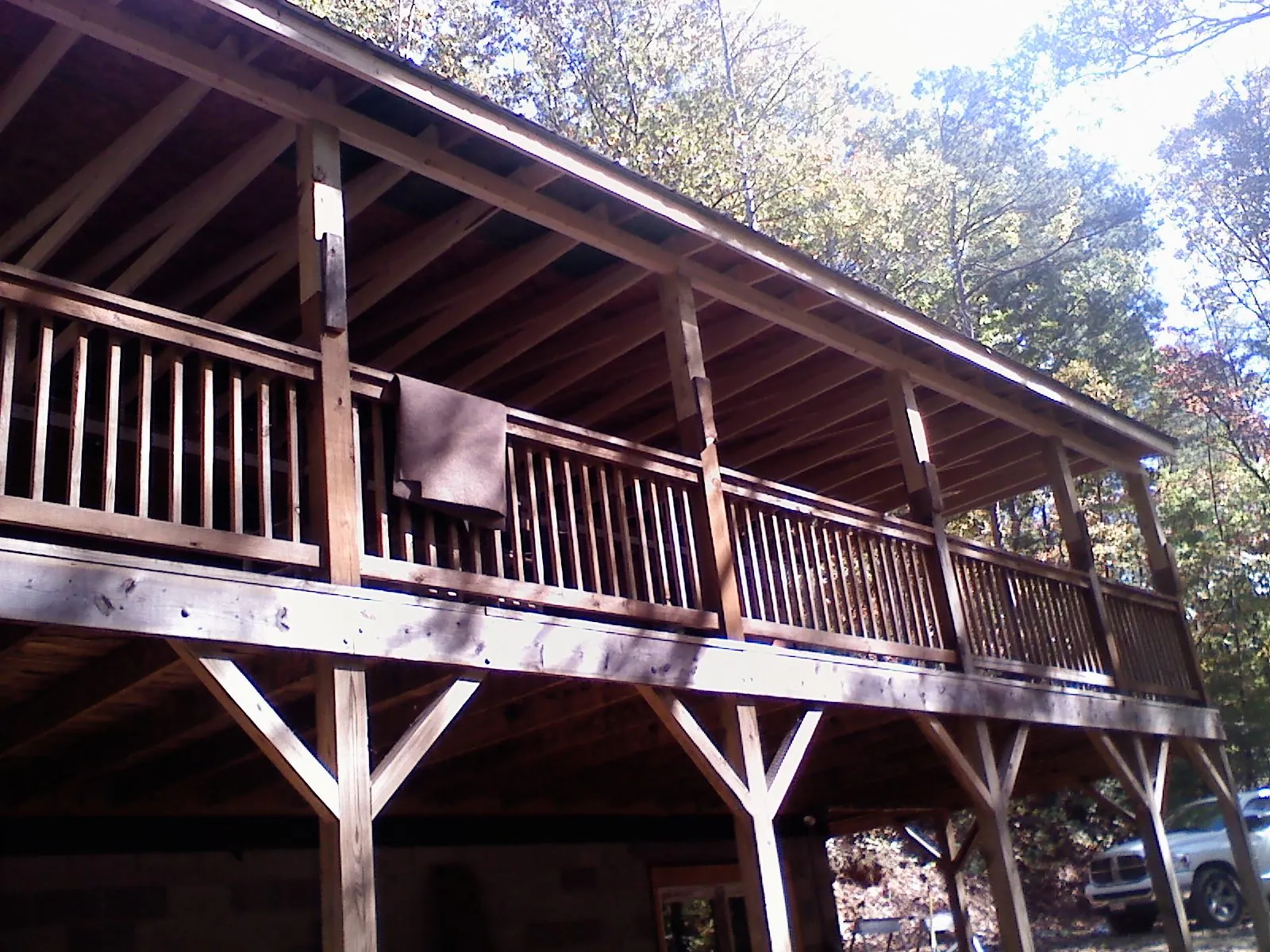 Timber framing under a new elevated porch and deck — Roof Leak Repair in Oconomowoc by Roofing Brothers